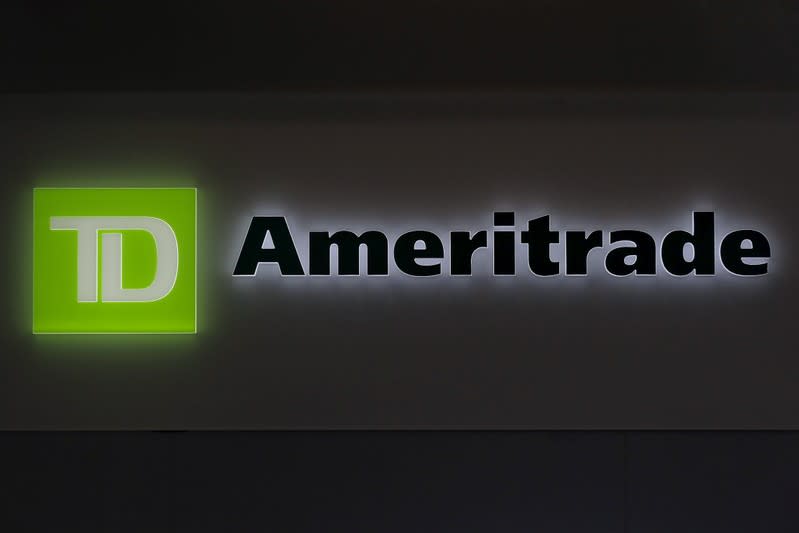 FILE PHOTO: A TD Ameritrade sign glows at the entrance to a branch in the financial district in New York