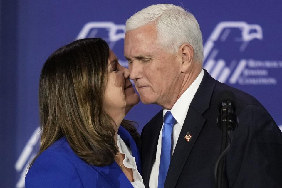 Karen Pence, left, kisses former Vice President Mike Pence at an annual leadership meeting of the Republican Jewish Coalition, Saturday, Oct. 28, 2023, in Las Vegas. | John Locher, Associated Press