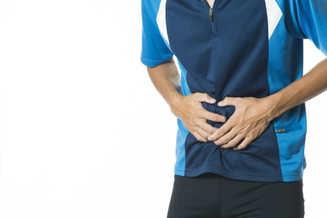 Man suffering from stomach pain