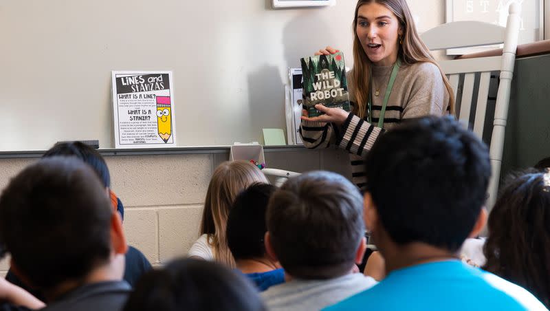 Jackie Rigby, a student teacher, reads to her classroom of third grade students at Whittier Elementary School in West Valley City on Tuesday, Jan. 30, 2024. Rigby is a student at the University of Utah studying elementary education.