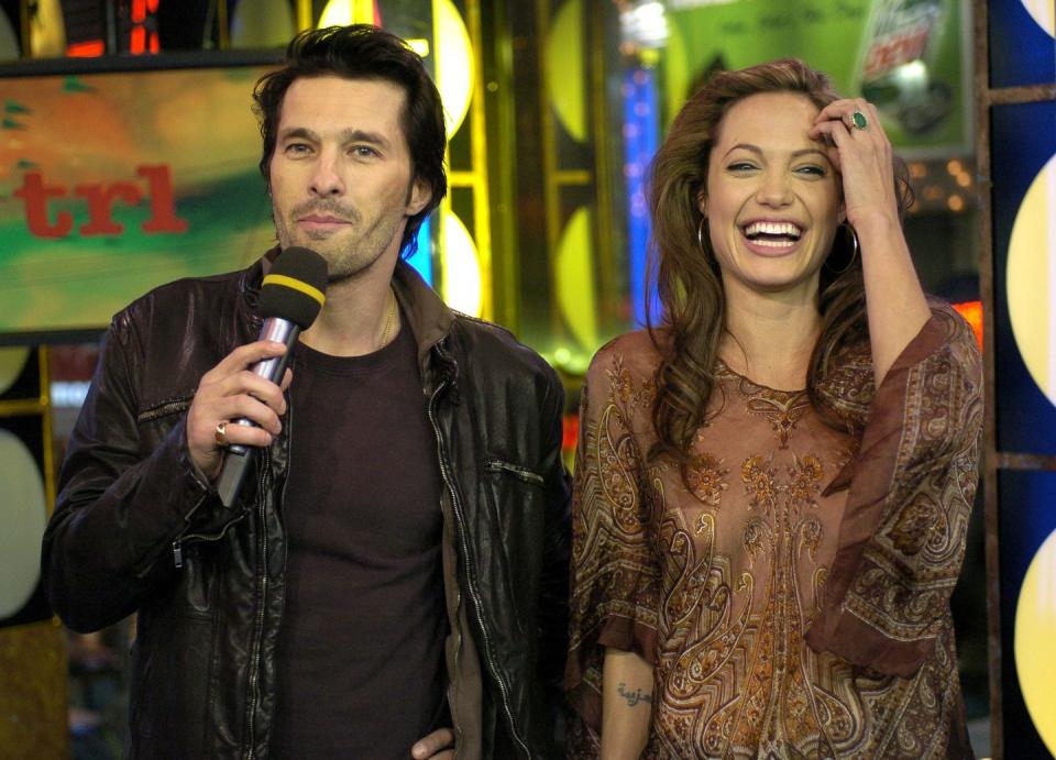 <p>Laughing at something Olivier Martinez said while on <em>TRL </em>in 2004.</p>