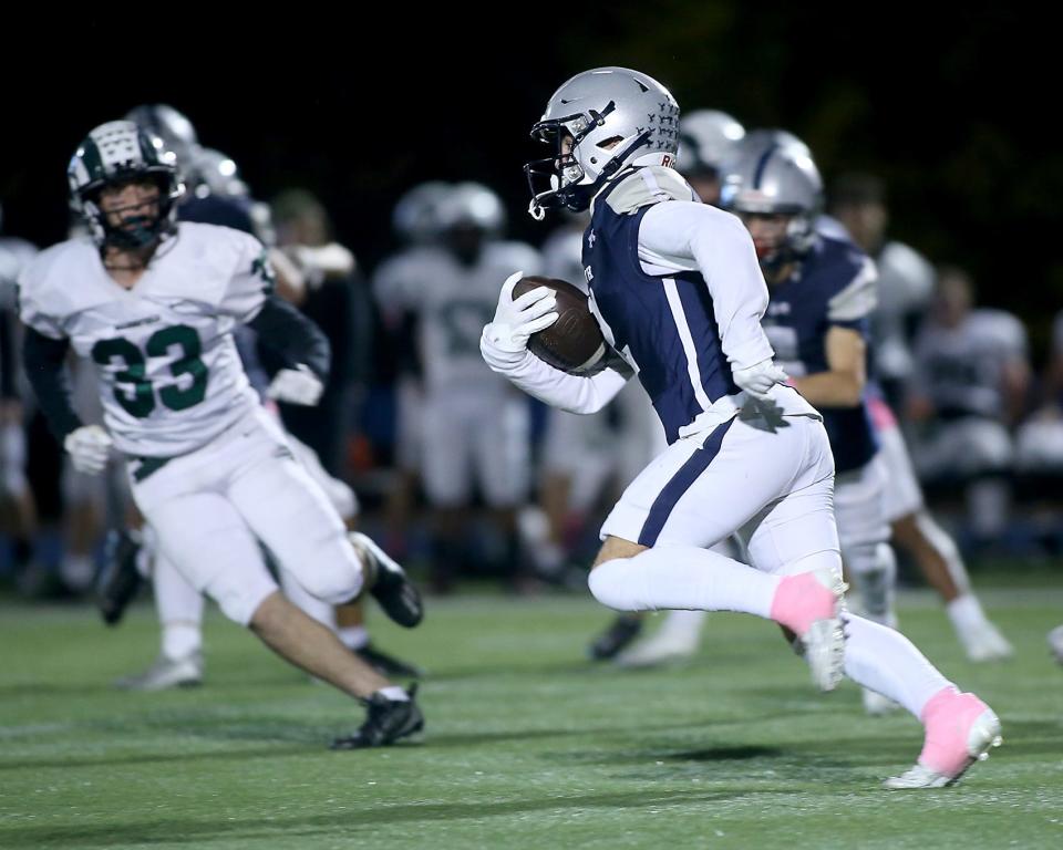 Plymouth North's Logan Zemotel takes it to the house on a kickoff return to cut Marshfield’s lead to 35-21 during third quarter action of their game at Plymouth North High School on Friday, Oct. 20, 2023. Marshfield would go on to win 49-28.