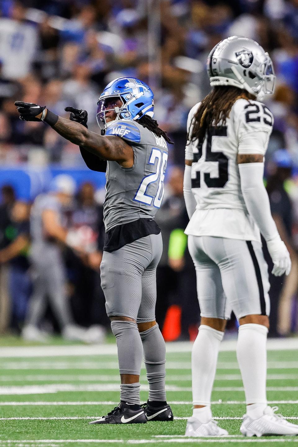 Detroit Lions running back Jahmyr Gibbs (26) celebrates a first down against Las Vegas Raiders during the second half at Ford Field in Detroit on Monday, Oct. 30, 2023.