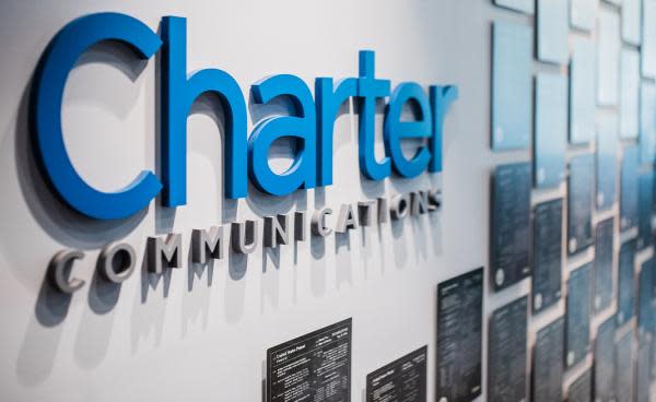  Charter Communications logo on a wall. 