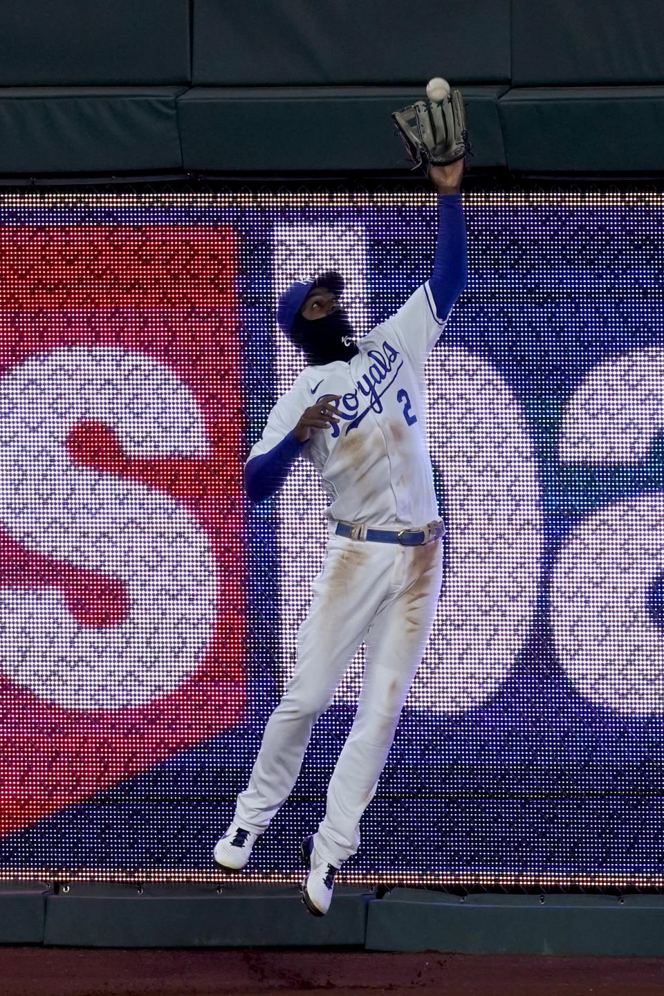 Kansas City Royals center fielder Michael A. Taylor can't catch an RBI triple by Willy Adames during the fifth inning of a baseball game Tuesday, April 20, 2021, in Kansas City, Mo. (AP Photo/Charlie Riedel)