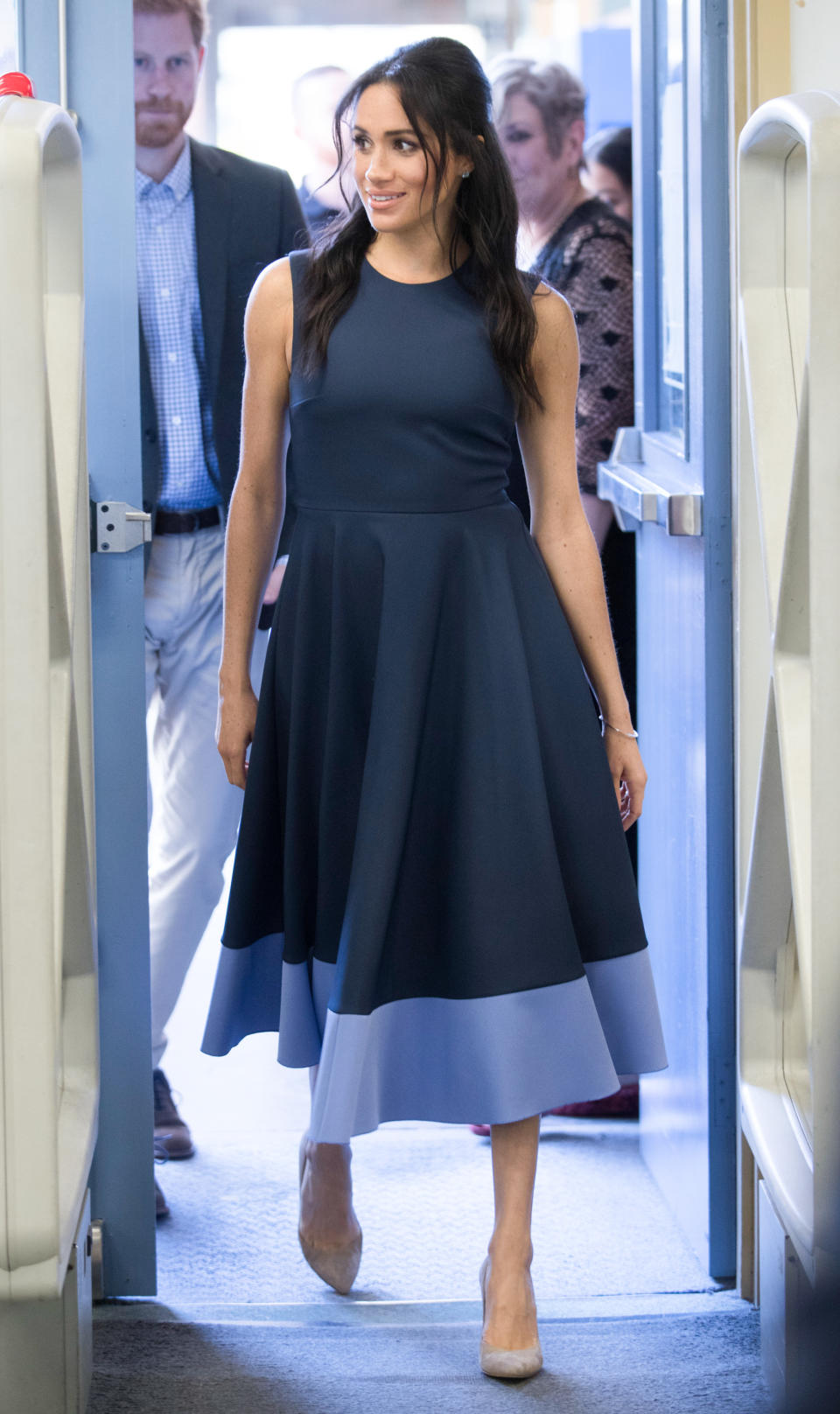 <p>For a visit to Macarthur Girls High School in Sydney, the Duchess wore a £1,299 A-line dress by Roksanda. She paired it with a pair of beige Stuart Weitzman Legend pumps, a white-gold Birks bracelet and Birks blue topaz earrings. <em>[Photo: Getty]</em> </p>