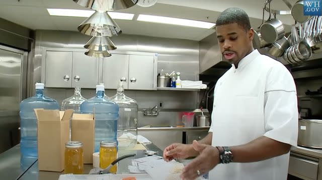 <p>The White House/Youtube</p> Tafari Campbell demonstrates beer brewing in the White House kitchen.