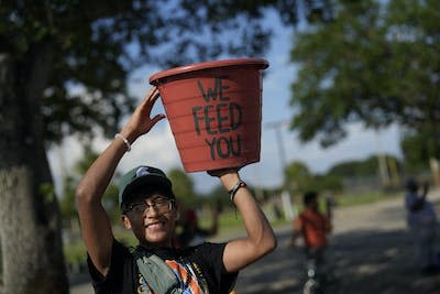 A 16-year-old protests against Florida Senate bill 1718 in Immokalee, Fla., an area known for its tomato-growing. <a href="https://newsroom.ap.org/detail/FloridaDayWithoutImmigrants/501122da6476404184d7931dfc59dec5/photo?Query=Senate%20Bill%201718&mediaType=photo&sortBy=arrivaldatetime:asc&dateRange=Anytime&totalCount=13&currentItemNo=10" rel="nofollow noopener" target="_blank" data-ylk="slk:Rebecca Blackwell/AP;elm:context_link;itc:0;sec:content-canvas" class="link ">Rebecca Blackwell/AP</a>