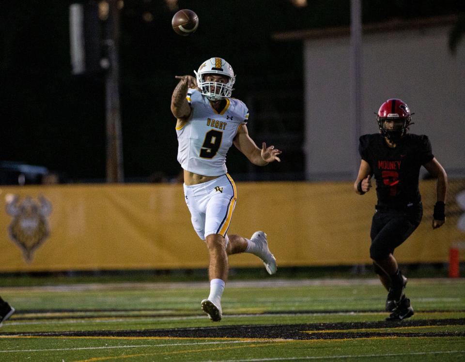 Carter Smith, the quarterback for the Bishop Verot football team throws a completion during a game against the Cardinal Mooney football team at Bishop Verot on Friday, Oct. 20, 2023. Bishop Verot won.