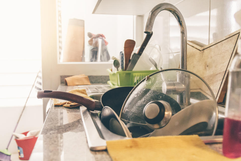 Leaving dirty dishes in the sink is another top pet peeve. (Getty Images)