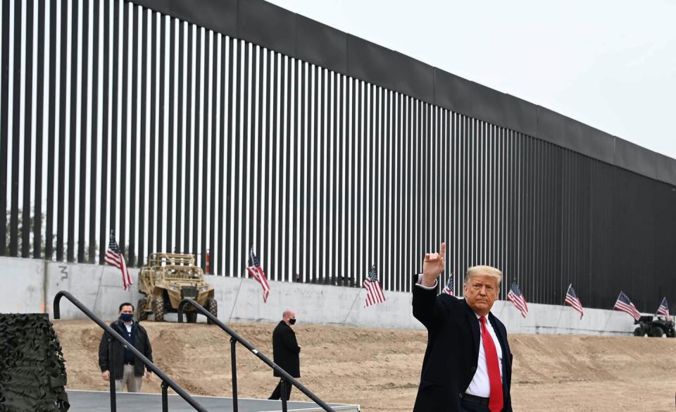 President Donald Trump tours a section of the U.S.-Mexico border wall in Alamo, Texas, on Jan. 12, 2021. <a href="https://www.gettyimages.com/detail/news-photo/president-donald-trump-tours-a-section-of-the-border-wall-news-photo/1230552879" rel="nofollow noopener" target="_blank" data-ylk="slk:Mandel Ngan/AFP via Getty Images;elm:context_link;itc:0;sec:content-canvas" class="link ">Mandel Ngan/AFP via Getty Images</a>