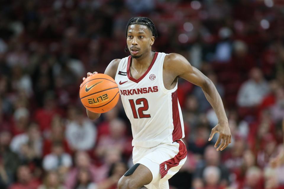 Dec 21, 2023; Fayetteville, Arkansas, USA; Arkansas Razorbacks guard Tramon Mark (12) dribbles in the second half against the Abilene Christian Wildcats at Bud Walton Arena. Arkansas won 83-73. Mandatory Credit: Nelson Chenault-USA TODAY Sports