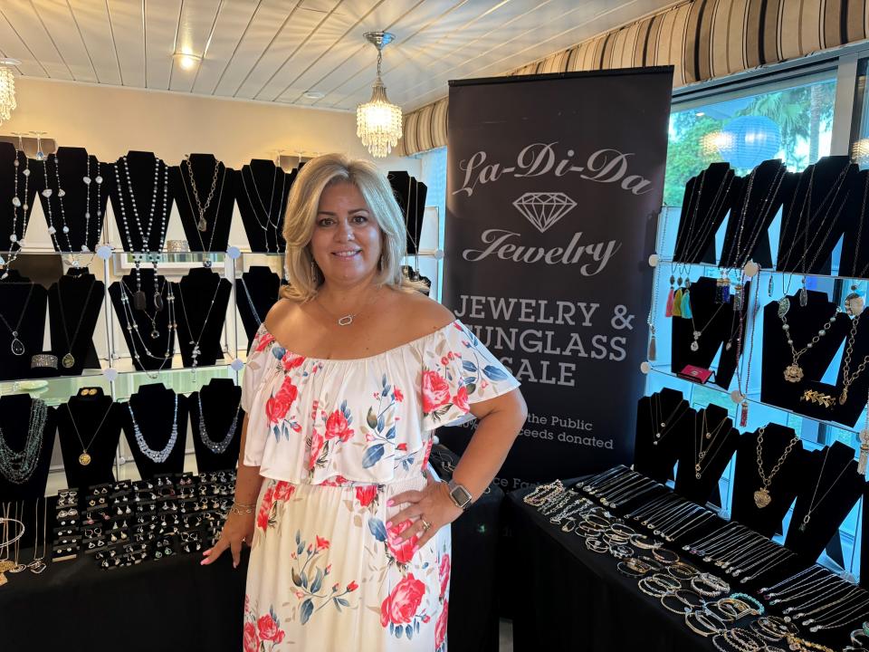 Andrea Boyd of La-Di-Da Jewelry shows her creations at Drag Me to Giving Under the Stars on Oct. 7, 2023.