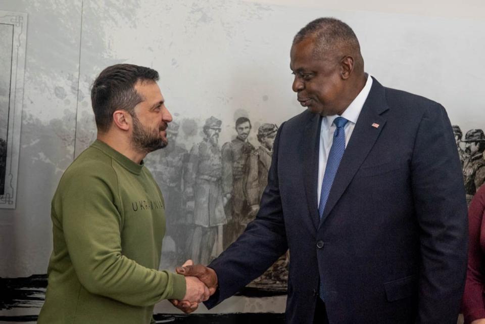 <em>Ukrainian President Volodymyr Zelenskyy shakes hands with Secretary of Defense Lloyd Austin in Washington, D.C., Dec. 11, 2023 (DoD)</em>