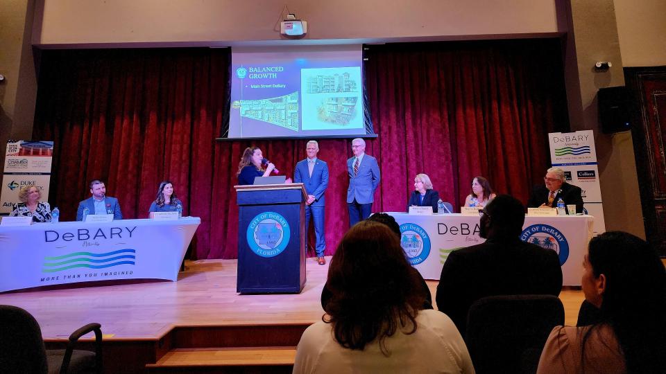 Roxanne Amoroso, founder and lead principal at Mosaic Development, LLC, speaks about the company's partnership with DeBary on designing a Main Street-style downtown adjacent to the SunRail station during the "State of the City" event on Tuesday, Jan. 10.