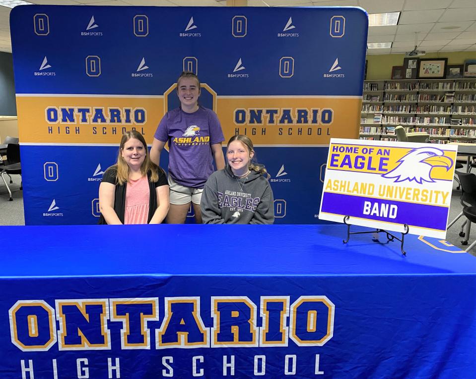 Payton Schisler (standing) will attend Ashland University in the fall.