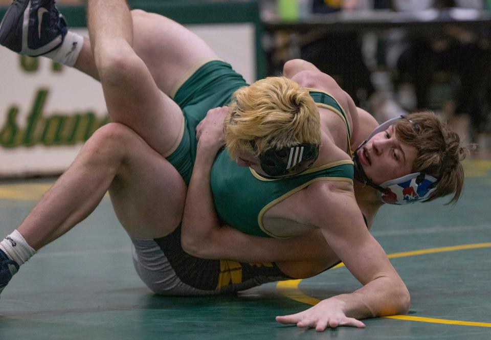 St. John Vianney freshman 144-pounder Cole Stangle (rear) tries to put Brick Memorial's Braden Scott on his back during his 12-6 win Thursday night in the Lancers' 40-31 win in a Shore Conference Tournament quarterfinal-round match.