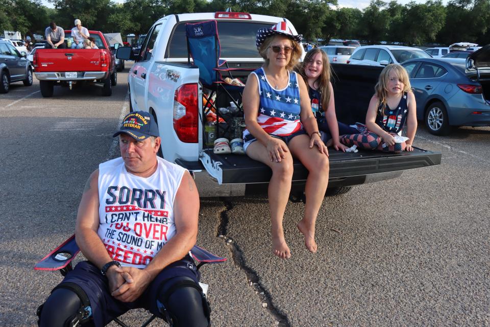 Darwin, Luelle, Loretta and Ella Hartman enjoy an evening of music and fireworks at the Canyon Fourth of July celebration Saturday evening at Happy State Bank Stadium.