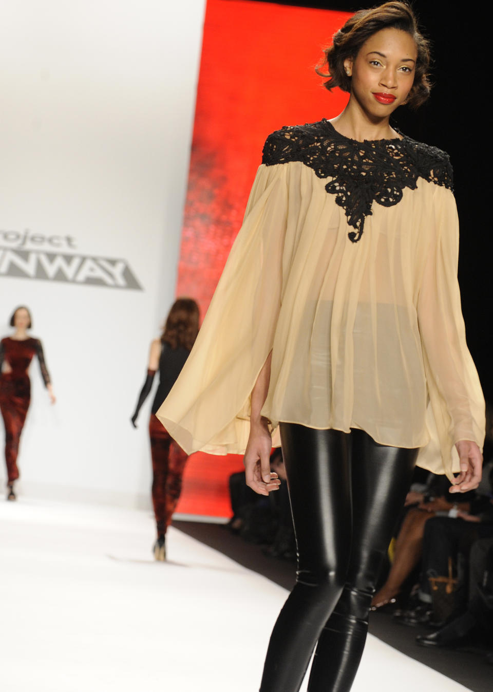 Fashion by the finalists of "The Project Runway" fashion competition series is modeled during Fashion Week, Friday Feb. 8, 2013, in New York. (AP Photo/Louis Lanzano)