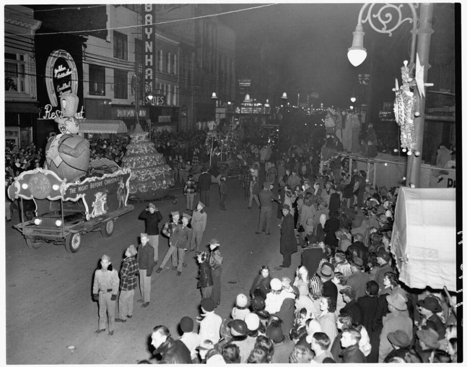 The Christmas parade down Lexington’s Main Street, Dec. 4, 1950 featured four giant book floats representing the poem “Twas the Night Before Christmas” and were billed as “the first attempt anyone has made to tell a story with balloons.”