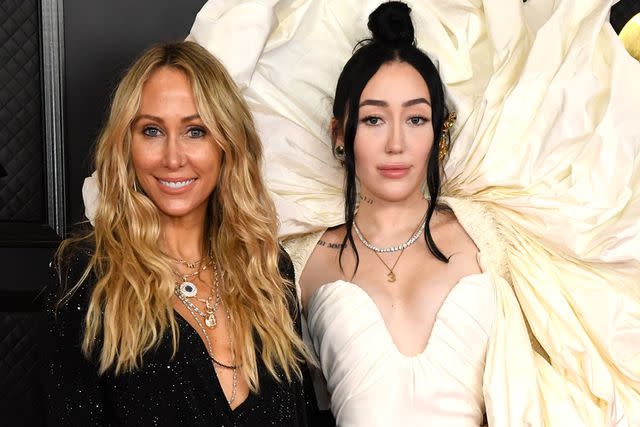 <p>Kevin Mazur/Getty</p> Tish Cyrus and Noah Cyrus on March 14, 2021 in Los Angeles, California.