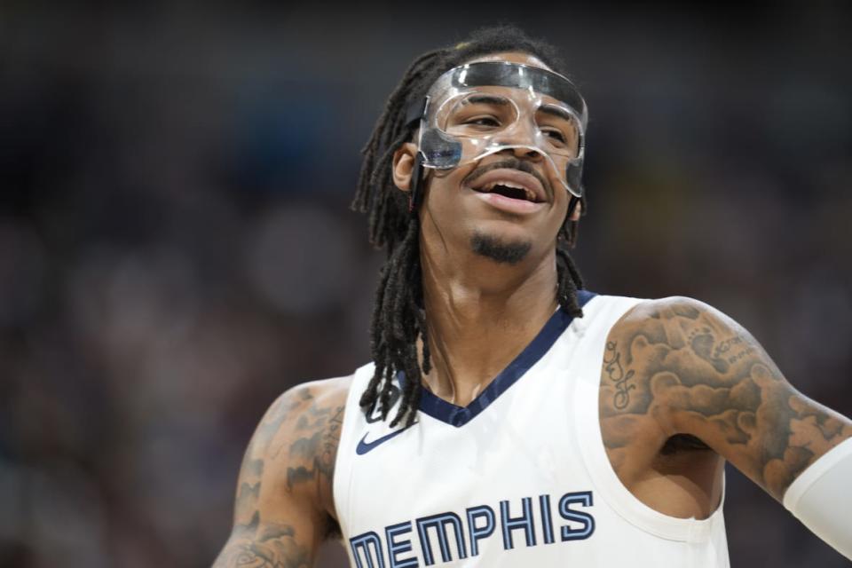 Memphis Grizzlies guard Ja Morant looks to the bench during the second half of the team’s NBA basketball game against the Denver Nuggets on Friday, March 3, 2023, in Denver. (AP Photo/David Zalubowski)