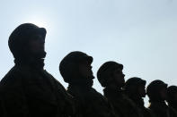 <p>Members of a Serbian military honour guard prepare for a wreath laying ceremony at the French military cemetery during the Armistice Day commemorations marking the end of World War I, in Belgrade, Serbia, Nov. 112017. (Photo: Koca Sulejmanovic/EPA-EFE/REX/Shutterstock) </p>