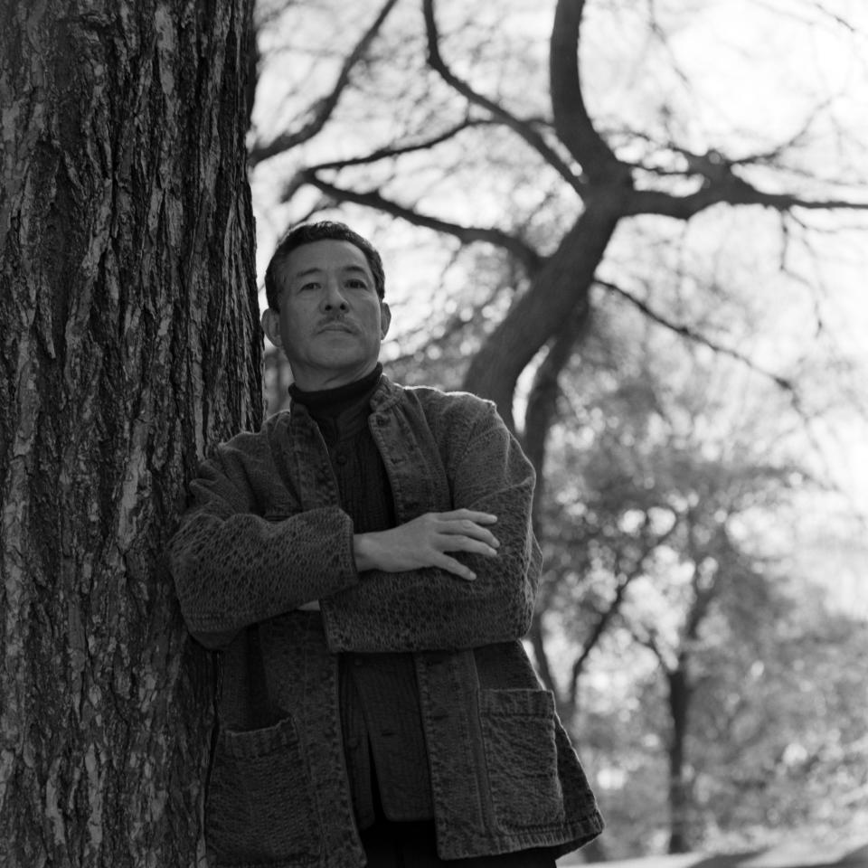 Portrait of designer Issey Miyake in New York's Central Park, 1996.