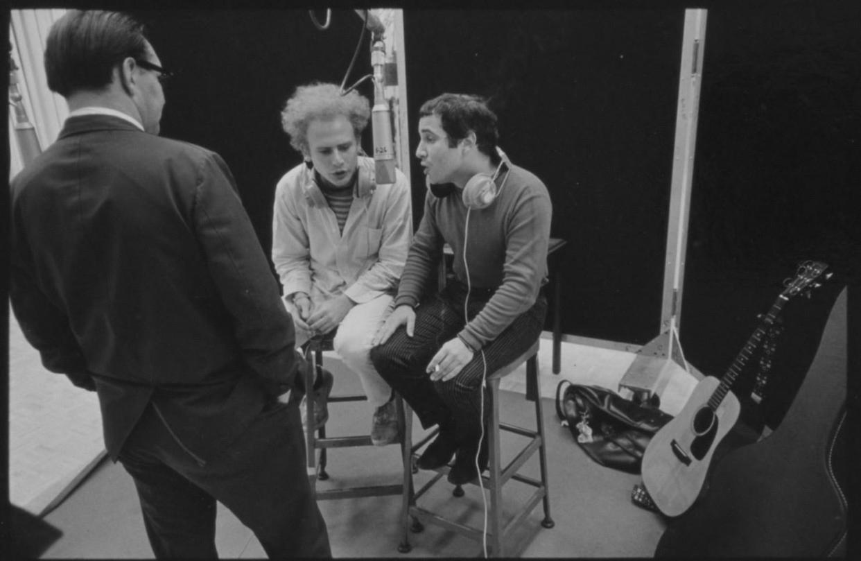 Art Garfunkel (left) and Paul Simon during a recording session for Columbia Records.