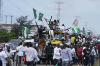 Supporters of Nigeria Labour Party's, Presidential Candidate, Peter Obi, during a rally in Lagos Nigeria, Saturday, Oct. 1, 2022. Presidential candidates in Nigeria's forthcoming election signed on Thursday, Sept. 29, 2022 an agreement committing to a peaceful campaign for the West African nation's 2023 presidential election. (AP Photo/Sunday Alamba)