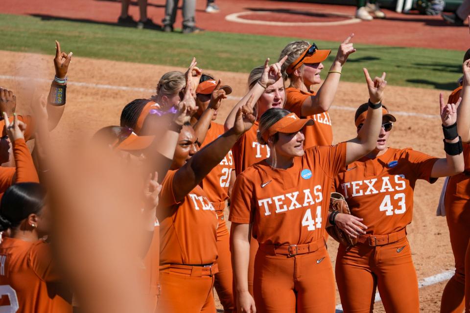 The No. 1 Texas softball team celebrates after beating Siena in the first game of the NCAA Tournament on Friday. The Longhorns will try and secure a spot in next week's Super Regionals Sunday against Northwestern.