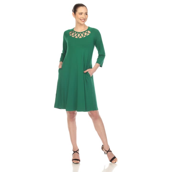 model wearing the green dress