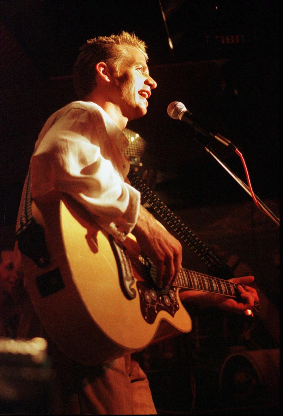 Charlie Robison performs his song "Bar Light" during the taping of his music video at the Continental Club in 1998.