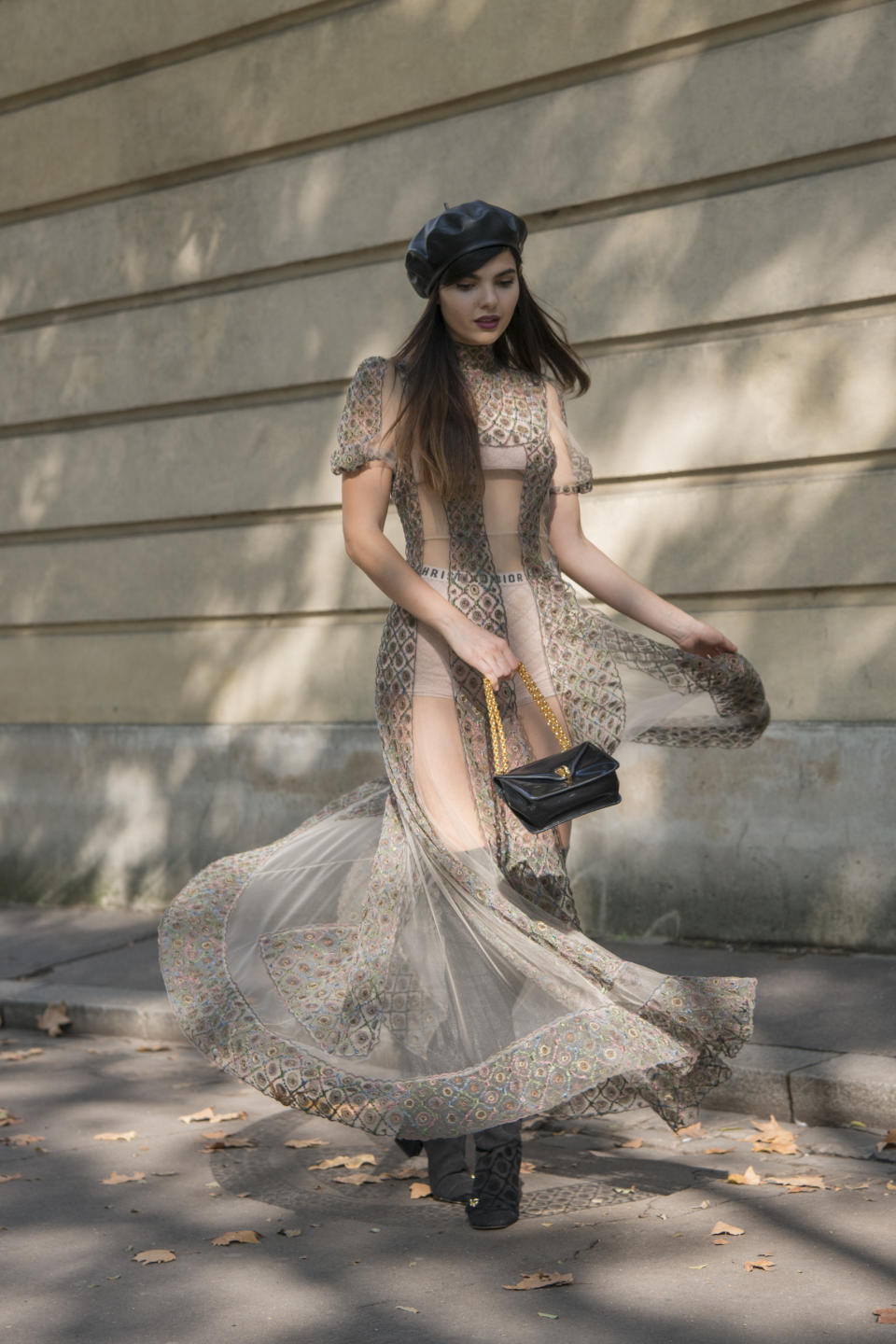 PARIS, FRANCE – SEPTEMBER 26 : Fashion blogger Diona Ciobanu wears a Dior dress, hat, bag, shoes and underwear day 1 of Paris Womens Fashion Week Spring/Summer 2018, on September 26, 2017 in London, England. (Photo by Kirstin Sinclair/Getty Images) *** Local Caption *** Diona Ciobanu