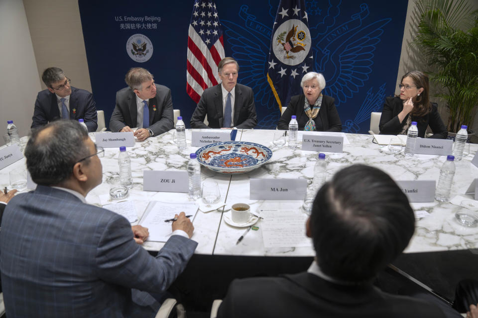 U.S. Treasury Secretary Janet Yellen, second from right, speaks at a climate finance roundtable discussion at the U.S. Embassy in Beijing, Saturday, July 8, 2023. (AP Photo/Mark Schiefelbein, Pool)