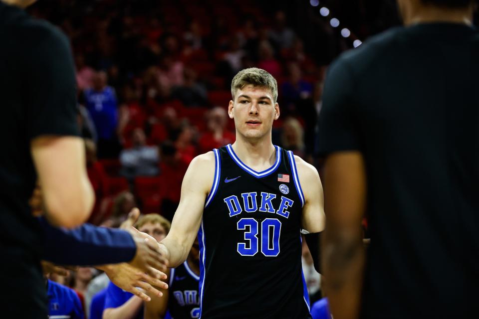 Mar 4, 2024; Raleigh, North Carolina, USA; Duke Blue Devils center Kyle Filipowski (30) walks out during the first half against North Carolina State Wolfpack at PNC Arena. Mandatory Credit: Jaylynn Nash-USA TODAY Sports