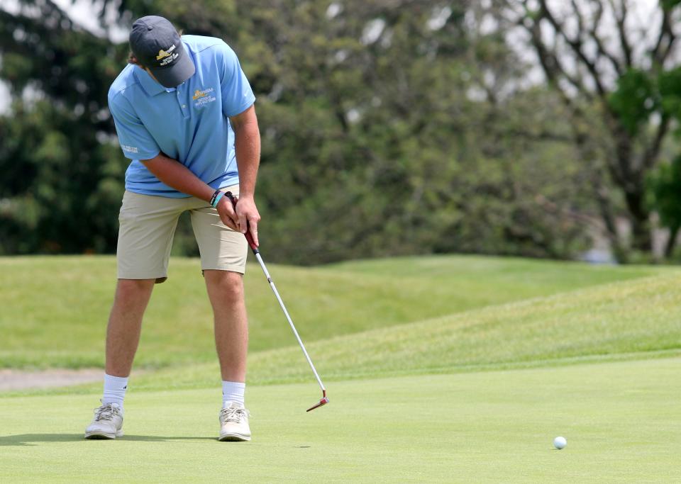 Vestal's Cameron Kretzmer putts on his finishing ninth hole during the New York State Public High School Athletic Association Boys Golf Championships at Elmira's Mark Twain Golf Course on June 6, 2022.