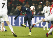 PSG's Neymar tries to score during the French Cup soccer match between Paris Saint Germain and Strasbourg at the Parc des Princes stadium in Paris, Wednesday, Jan. 23, 2019. (AP Photo/Michel Euler)