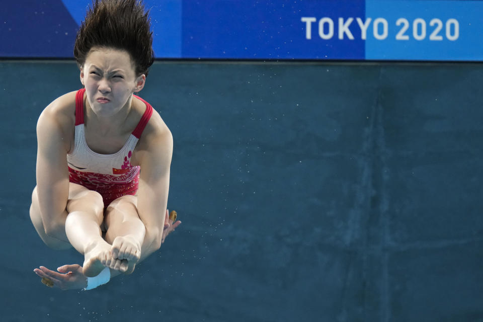 FILE - Second placed Chen Yuxi competes in women's diving 10-meter platform final at the 2020 Summer Olympics, on Aug. 5, 2021, in Tokyo, Japan. Chinese divers are focused on winning all eight gold medals at the Paris Olympics. The Chinese have dominated the sport for decades but have never won every gold medal in diving in a single Olympics. (AP Photo/Alessandra Tarantino, File)