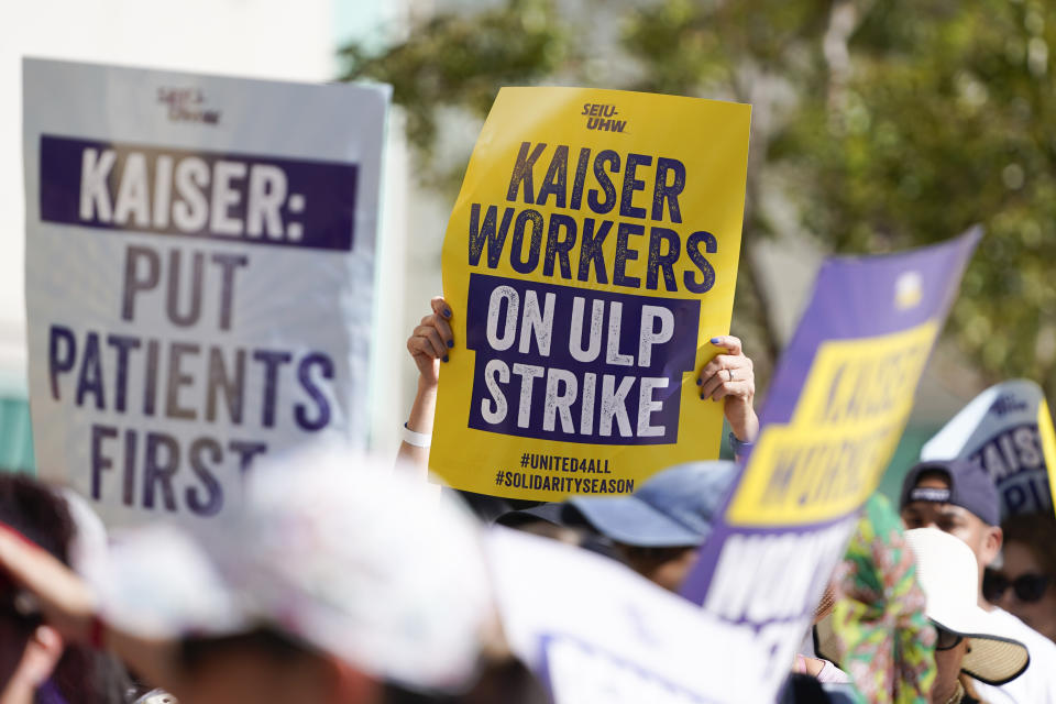 Kaiser Permanent workers picket Thursday, Oct. 5, 2023, in Baldwin Park, Calif. Some 75,000 Kaiser Permanente hospital employees who say understaffing is hurting patient care walked off the job in five states and the District of Columbia, kicking off a major health care worker strike.(AP Photo/Ryan Sun)