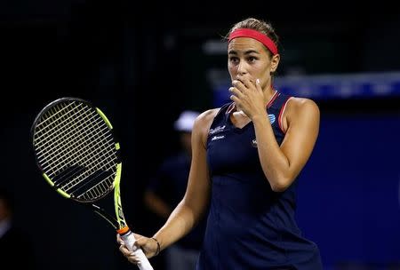 Tennis - Pan Pacific Open Women's Singles Quarterfinal match - Ariake Coliseum, Tokyo, Japan - 23/09/16. Monica Puig of Puerto Rico reacts after losing a point by Agnieszka Radwanska of Poland. REUTERS/Kim Kyung-Hoon