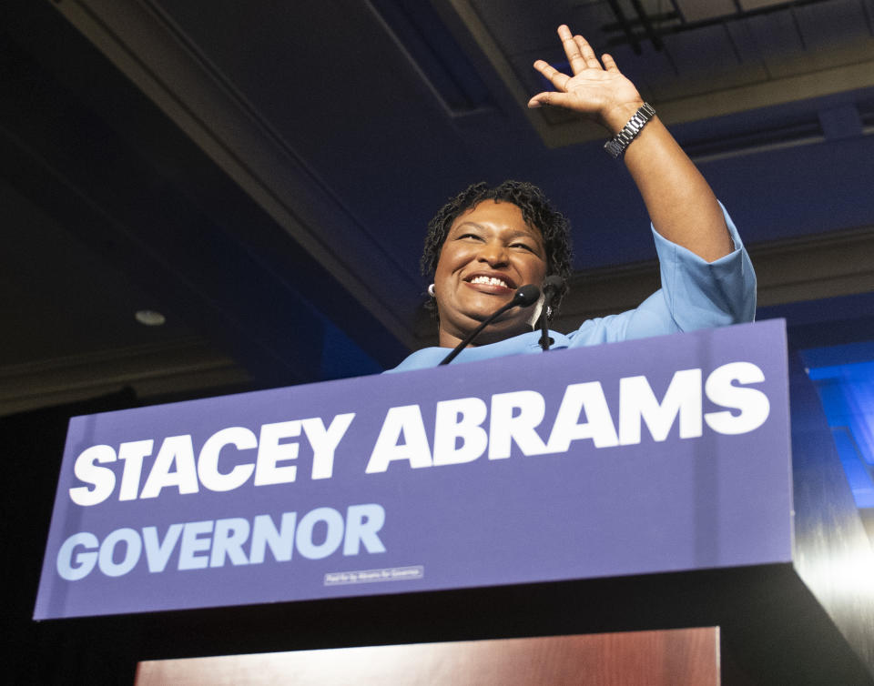 Georgia Democratic gubernatorial candidate Stacey Abrams speaks to supporters about a suspected run-off during an election night watch party, Tuesday, Nov. 6, 2018, in Atlanta. Abrams, the first black woman to be a major party nominee for governor in the United States, faced Republican challenger Georgia Secretary of State Brian Kemp. (AP Photo/John Amis)