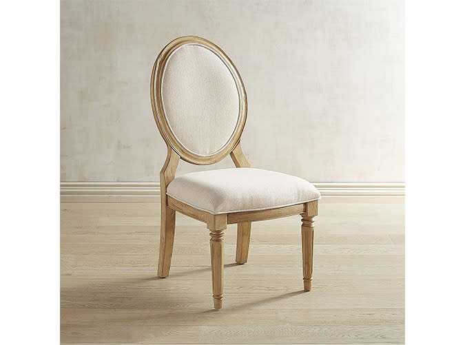 <p>Oh, happy day! The budget French chair we’ve been waiting for.</p> <p><a rel="nofollow noopener" href="http://www.pier1.com/magnolia-home-emery-ivory-side-chair/3261604.html?cgid=magnolia-home" target="_blank" data-ylk="slk:Emery Ivory Side Chair;elm:context_link;itc:0;sec:content-canvas" class="link "><em>Emery Ivory Side Chair</em></a><em> ($280)</em></p>