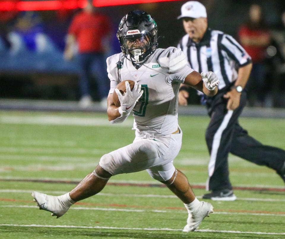 Choctaw RB Cole Tabb carries the ball during the Fort Walton Beach-Choctaw football game at Fort Walton Beach. Tabb was sidelined with an injury in previous games.