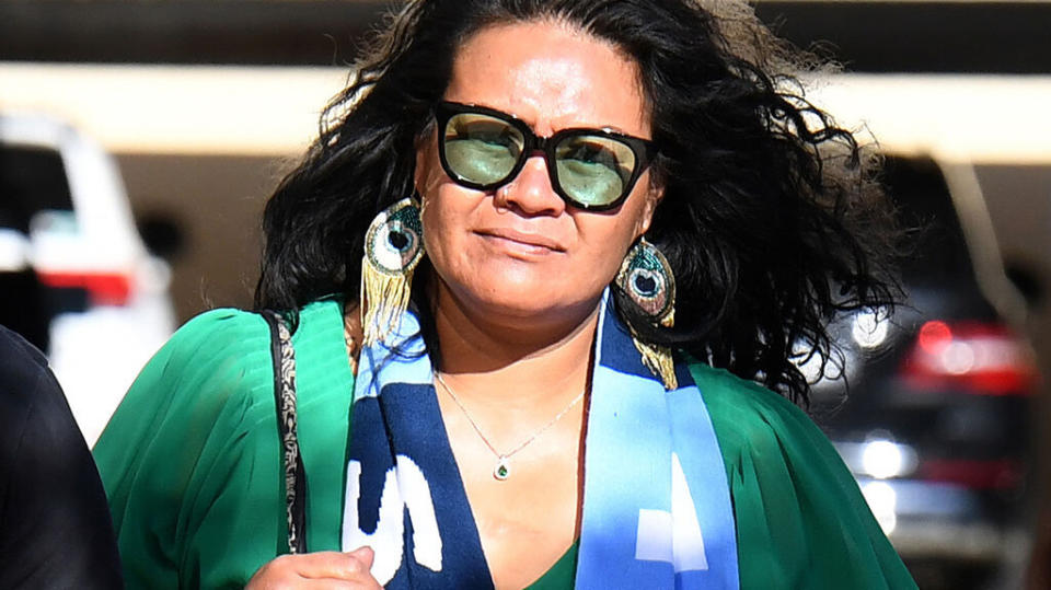 Uiatu Taufua arrives at court wearing a NSW Blues scarf on Wednesday. Pic: AAP