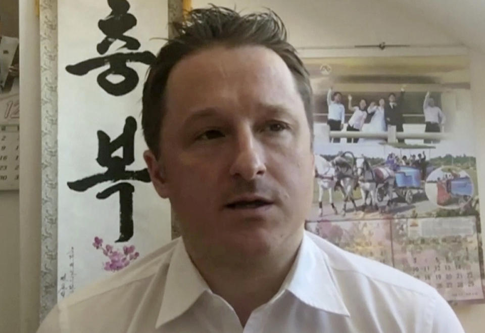 FILE - In this March 2, 2017, file image made from video, Michael Spavor, director of Paektu Cultural Exchange, talks during a Skype interview in Yanji, China. China has charged two detained Canadians with spying in cases linked to Canada’s arrest of a Huawei executive on U.S. charges. Chinese prosecutors said Friday, June 19, 2020, that Spavor and Michael Kovrig have been charged. (AP Photo, File)