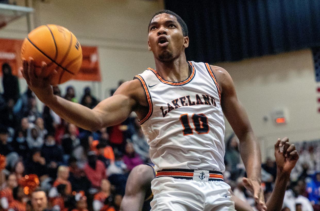 Lakeland guard Tyler Williams goes up for a layup against Winter Haven in the first quarter on Monday night.