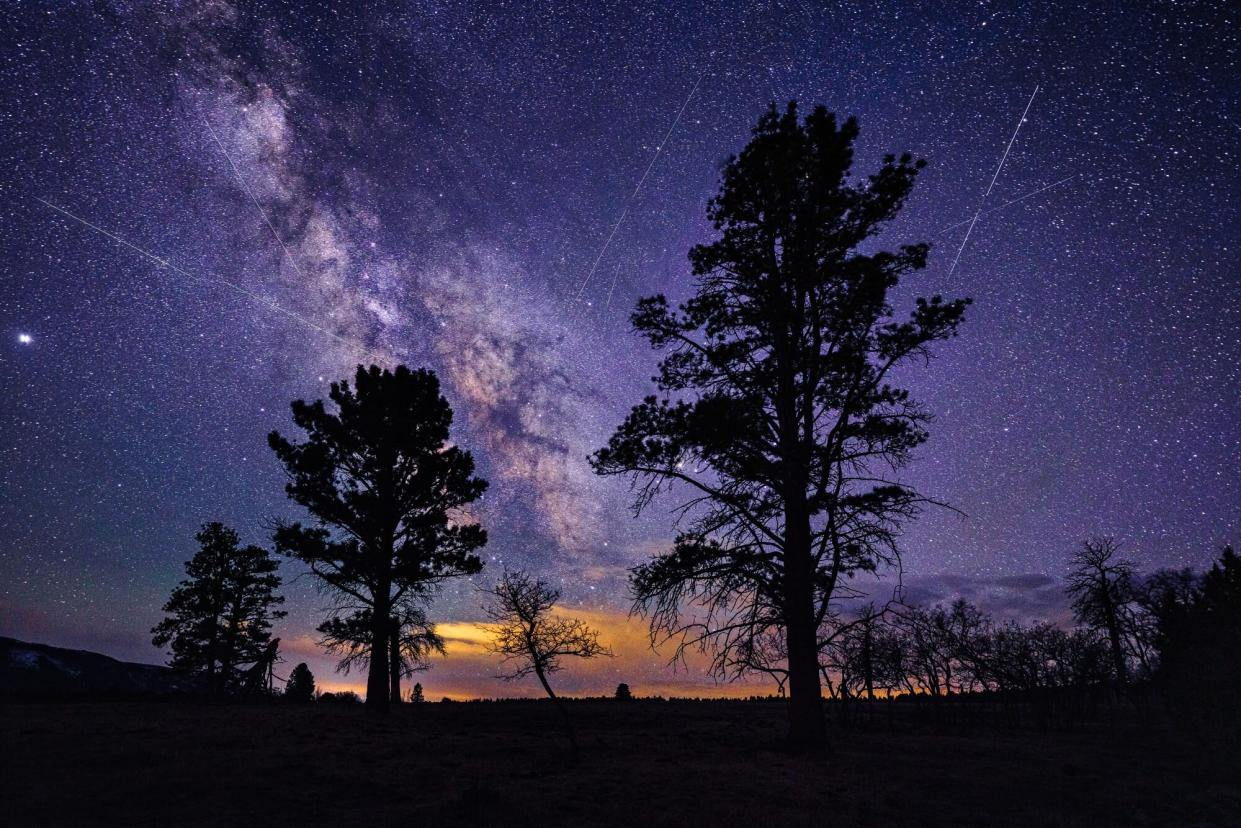 Meteor shower in night sky