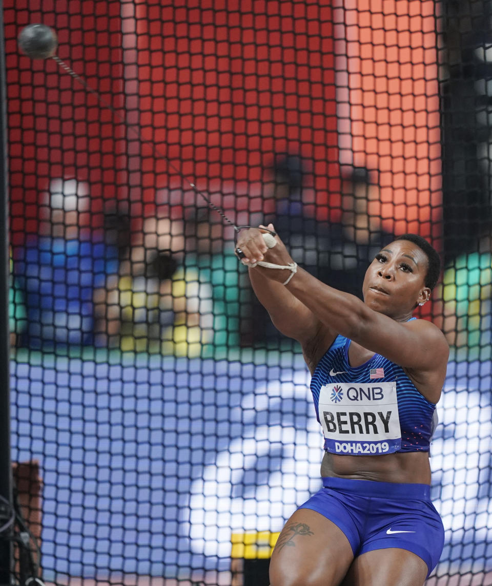 Gwen Berry, of the United States, competes in the women's hammer throw final at the World Athletics Championships in Doha, Qatar, Saturday, Sept. 28, 2019. (AP Photo/David J. Phillip)