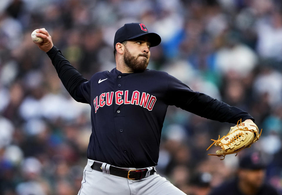 Cleveland Guardians starting pitcher Aaron Civale throws to a Seattle Mariners batter during the first inning of a baseball game Saturday, April 1, 2023, in Seattle. (AP Photo/Lindsey Wasson)